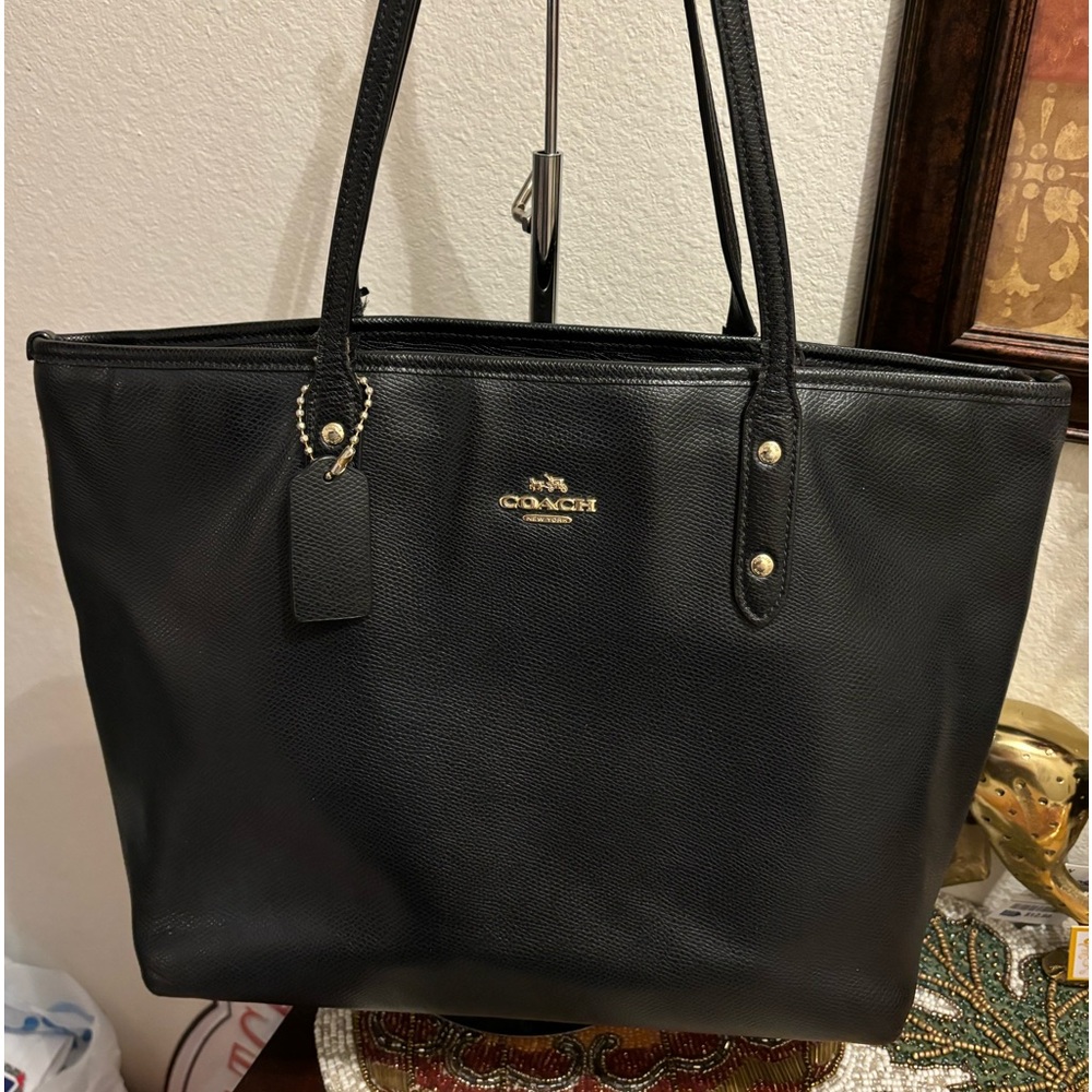 Coach large black leather tote. Great size &shape.Handleshave  wear as shown.GUC